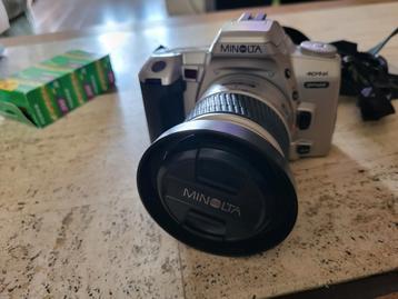 Minolta analoog spiegelreflex fotocamera met telelens en tas beschikbaar voor biedingen