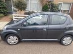Toyota Aygo 1.0 12V Vvt-i 5DRS 2010 Grijs, Auto's, Voorwielaandrijving, 4 stoelen, 68 pk, Origineel Nederlands