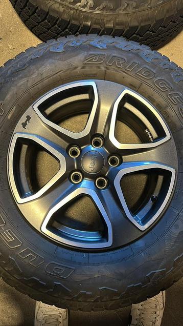 Bridgestone dueler banden met originele jeep velgen beschikbaar voor biedingen