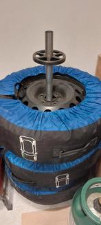 Winterbanden op velg met opbergrek, Ophalen