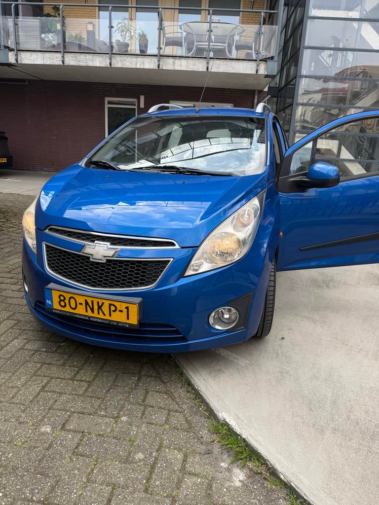 Chevrolet Spark 1 Bifuel 2010 Blauw BENZINE/LPG. Nieuwe APK, Auto's, Euro 5, 37 €/maand, 4 cilinders, Blauw