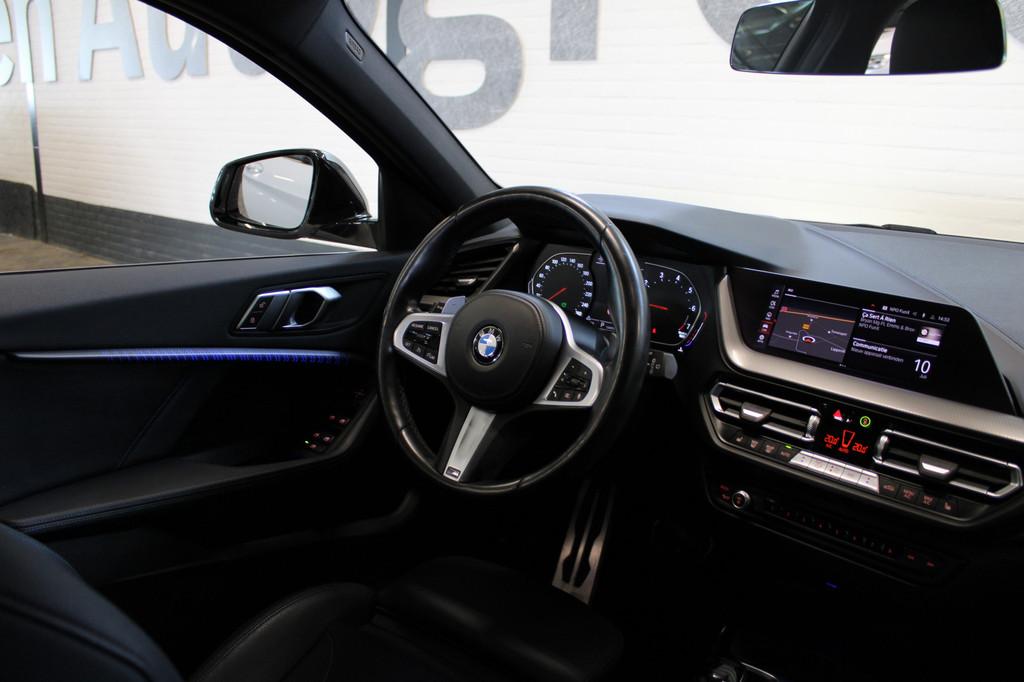 BMW 1-serie M135i xDrive High Executive | Akrapovič uitlaat, 1998 cc, Gebruikt, 4 cilinders, Leder en Stof