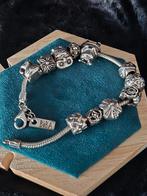 Biba armband met 11 bedels, Zilver zolder, Ophalen of Verzenden, Zo goed als nieuw, Met bedels of kralen