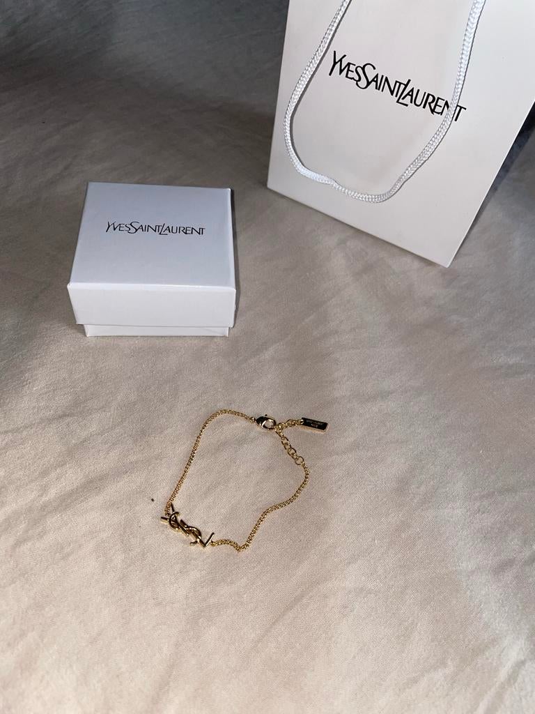 YSL armband goudkleurig, Sieraden, Tassen en Uiterlijk, Armbanden, Ophalen of Verzenden, Gebruikt, Goud, Overige materialen