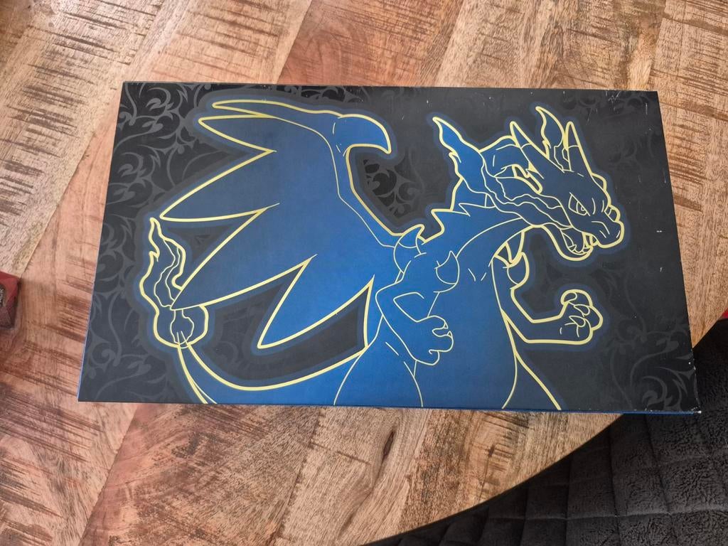 Charizard pokemon ( lege doos ) ook teruil parfum, Avontuur en Actie, 1 speler, Ophalen of Verzenden, Zo goed als nieuw