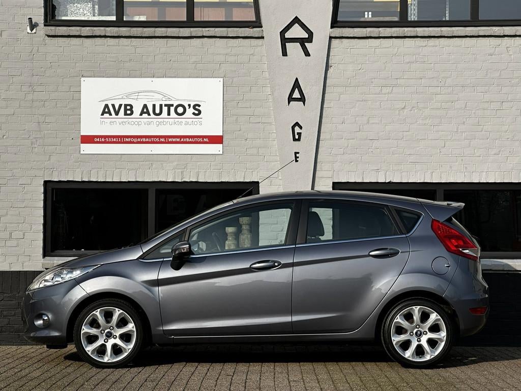 Ford Fiesta 1.25 Titanium Clima Spoiler Stoelverwarming, Voorwielaandrijving, Stof, Gebruikt, 82 pk