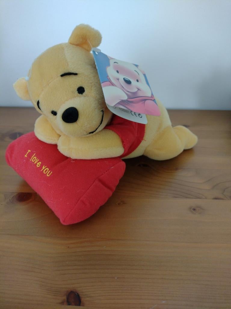 Winnie de Poeh knuffel met kussentje, Ophalen
