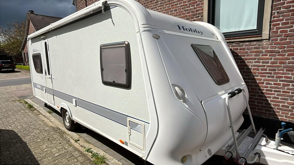Hobby Excelsior 560, Caravans en Kamperen, Caravans, Rondzit, Hobby, Frans bed, 7 tot 8 meter