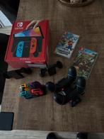 Nintendo Switch OLED met 2 games en extra controllers, Eén computer, Ophalen of Verzenden, Zo goed als nieuw, Platform