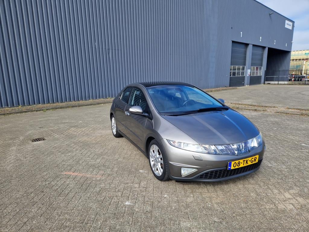 Honda Civic 1.8 I 5DR 2006 Grijs, Auto's, Honda, Voorwielaandrijving, Zwart, 4 cilinders, Leder en Stof