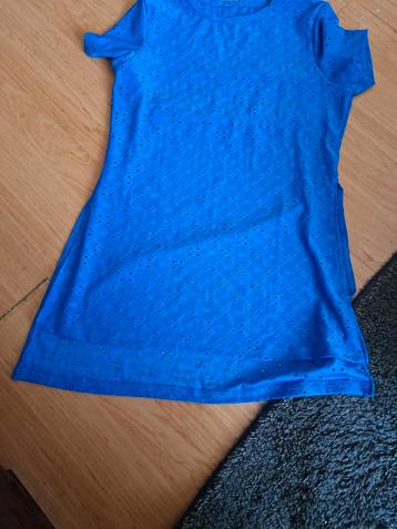 Blauw shirt maat 38/40 beschikbaar voor biedingen