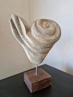 Mooi decoratief beeld, Ophalen