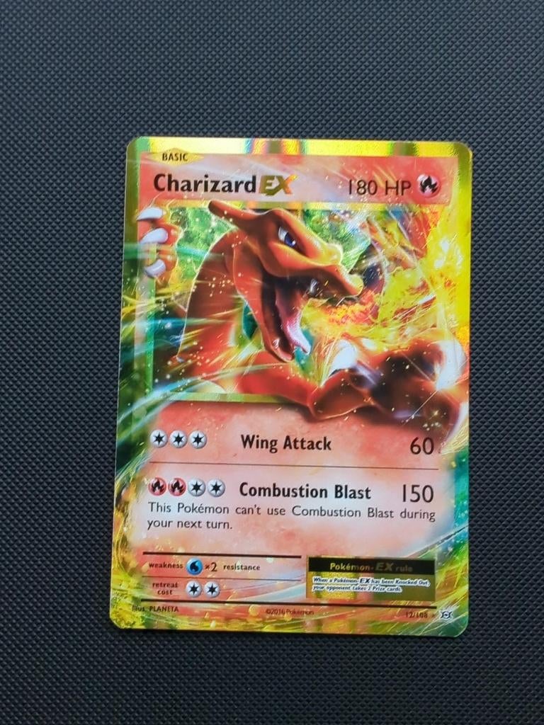 Charizard EX 12 EVO, Ophalen of Verzenden, Zo goed als nieuw