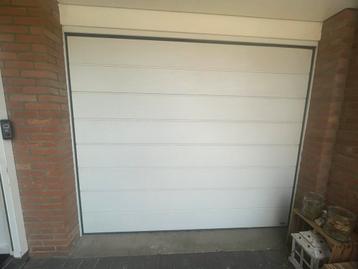 Elektrische garagepoort Novoferm beschikbaar voor biedingen