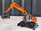 Hitachi zaxis 140w met bietengrijper schaal 1:50 geen conrad, Hobby en Vrije tijd, Modelauto's | 1:50, Ophalen of Verzenden, Zo goed als nieuw