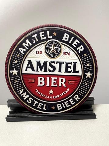 Amstel Bier metalen reclamebord rond beschikbaar voor biedingen