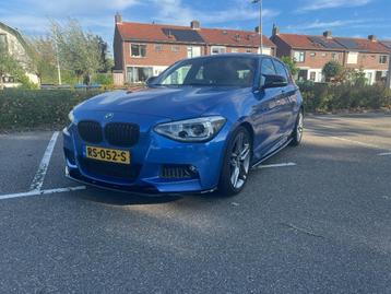 BMW 1-Serie 116i 220PK 5D Aut. 2014 Blauw beschikbaar voor biedingen