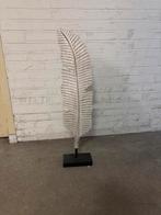 Decoratie veer, Ophalen