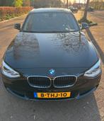 BMW 1-Serie 116I 100KW 5DR Aut8 2014 Zwart, Auto's, 65 €/maand, 4 cilinders, Zwart, Origineel Nederlands