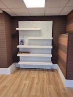 Winkelinrichting. Presentatiewanden en dubbelzijdig display, Ophalen