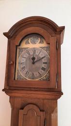 Mooie Staande Klok, Ophalen