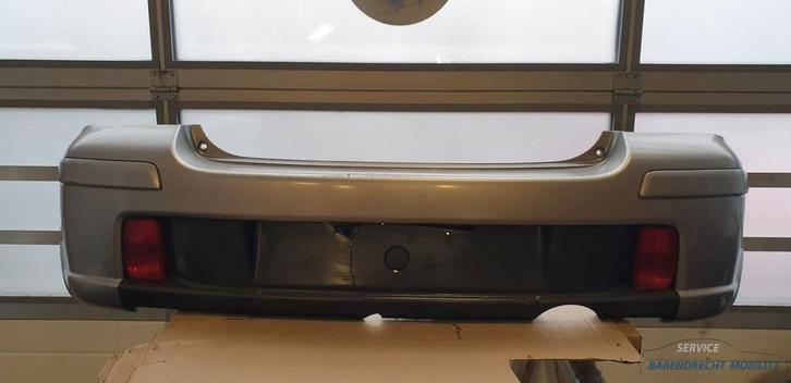 Achterbumper Toyota Yaris I Topsport 5215952470 TS origineel, Auto-onderdelen, Carrosserie en Plaatwerk, Bumper, Toyota, Achter