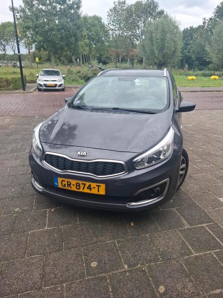 Kia (Pro) Cee d 1.6 GDI Sporty Wagon 2015 Grijs, Auto's, Kia, Bedrijf, (Pro) Cee d, Achteruitrijcamera, Adaptieve lichten, Airbags