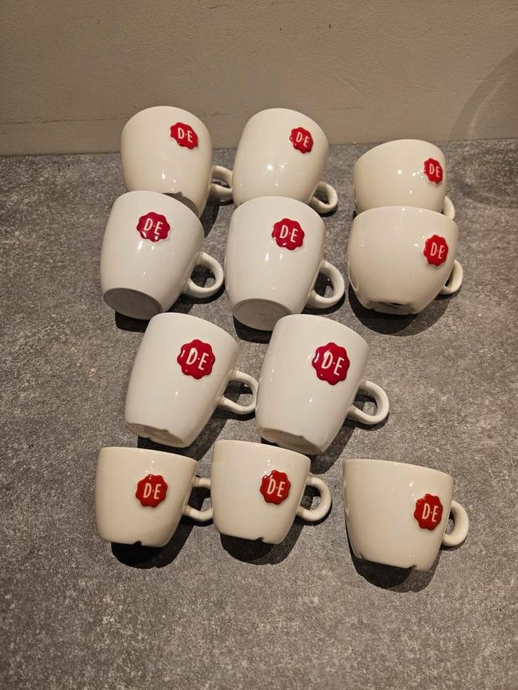 Set van 11 Douwe Egberts kopjes, Huis en Inrichting, Keuken | Servies, Zo goed als nieuw, Kop(pen) en/of Schotel(s), Overige stijlen