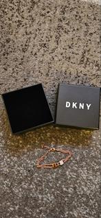 DKNY rosekleurig Armband - Nieuwstaat, Sieraden, Tassen en Uiterlijk, Armbanden, Ophalen of Verzenden, Zo goed als nieuw, Roze