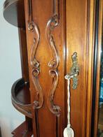 notenhout kast, Ophalen