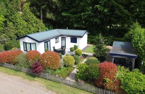 L-vormig 4-persoons chalet in Stroe, Caravans en Kamperen, Stacaravans, tot en met 4, Ophalen of Verzenden
