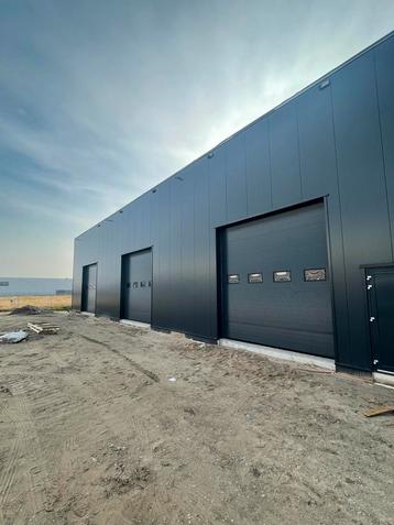 Nieuwe alle maten industriedeuren, overheaddeuren, roldeuren beschikbaar voor biedingen