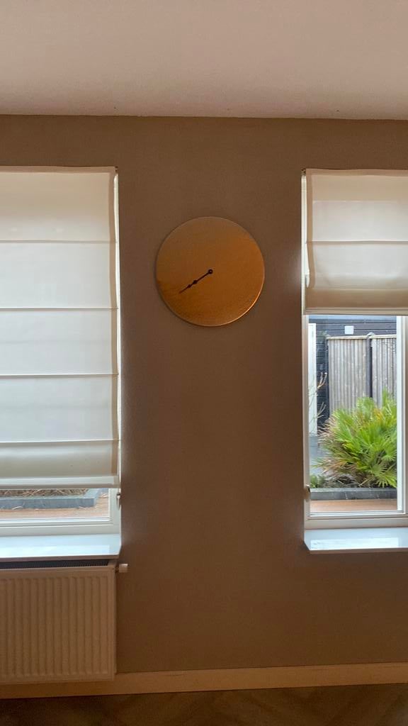 Klok in de kleur goud, Huis en Inrichting, Woonaccessoires | Klokken, Ophalen of Verzenden, Wandklok