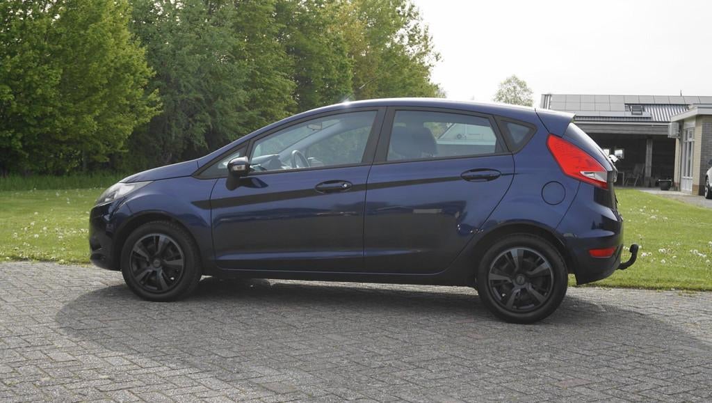 Ford Fiesta 1.25 Limited 5 Drs Airco trekhaak, Auto's, Ford, Voorwielaandrijving, Euro 5, Stof, 4 cilinders