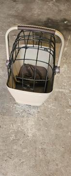 Hondenmand fiets achterop, Ophalen