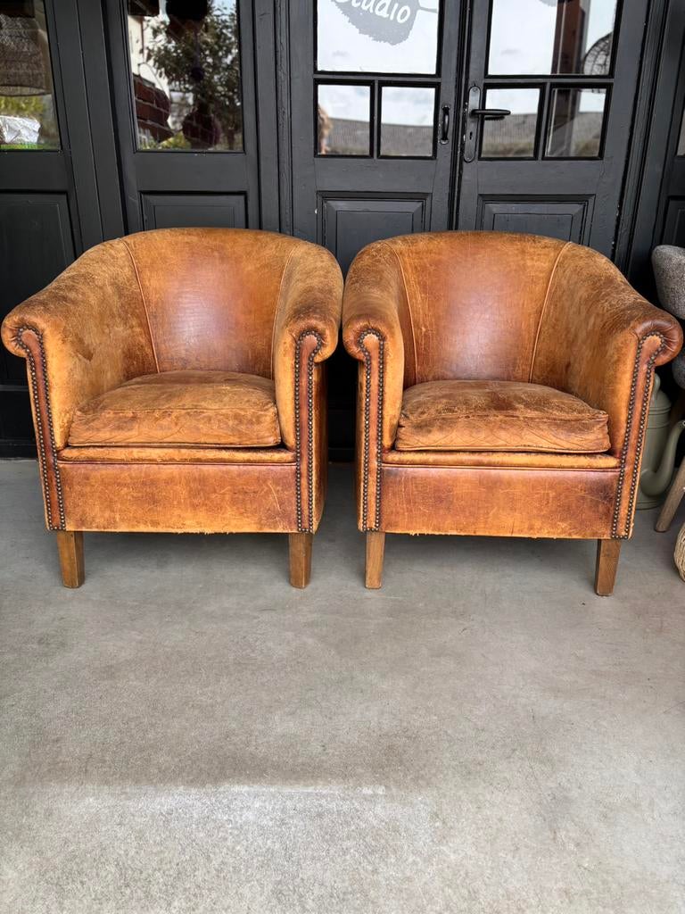 2 Vintage Stoere Geleefde Schapenleren Clubfauteuils, Zo goed als nieuw, 50 tot 75 cm, Leer, 75 tot 100 cm