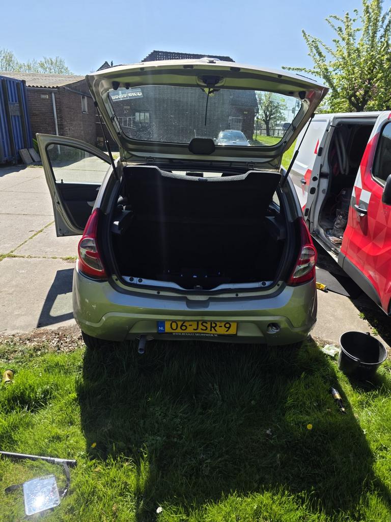 Dacia Sandero 1.2 16V 55KW 2009 Grijs, Auto's, Dacia, Voorwielaandrijving, 74 pk, 31 €/maand, Origineel Nederlands