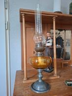Oude olielamp met glazen kap, Ophalen