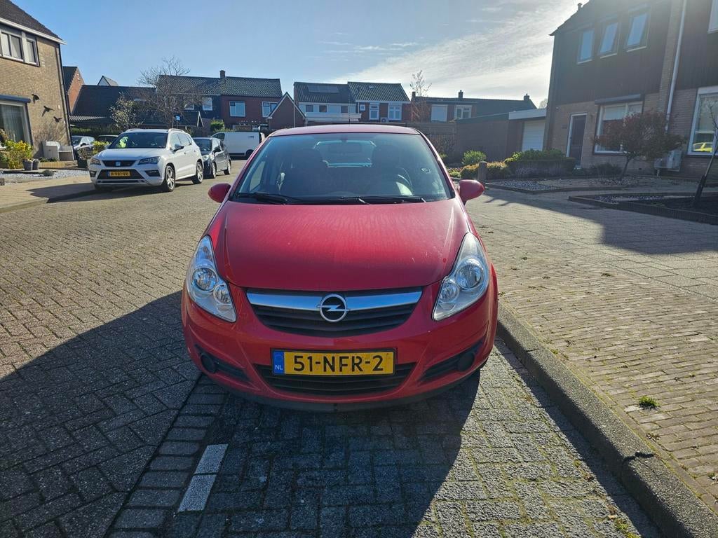 Opel Corsa 1.4 16V 5D 2010 Rood GOEDKOPE AUTO!, Auto's, Voorwielaandrijving, 4 cilinders, 100 pk, Origineel Nederlands