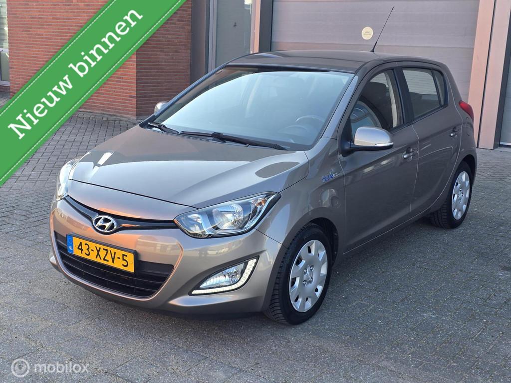 Hyundai i20 1.2i i-Motion✅️Airco✅️Apk✅️, Auto's, Euro 5, Gebruikt, 31 €/maand, Bruin