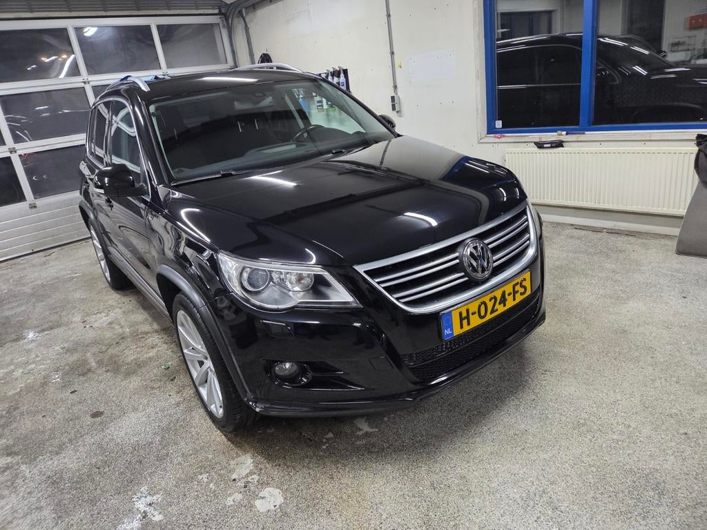 Volkswagen Tiguan 1.4 TSI 110KW 2011 Zwart, Auto's, Volkswagen, Voorwielaandrijving, Navigatiesysteem, 1800 kg, Zwart