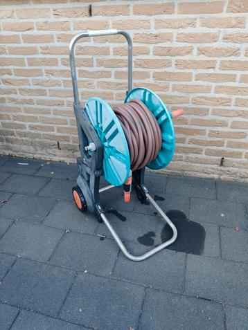 Te koop: Gardena slangenwagen met 15 m Gardena tuinslang  beschikbaar voor biedingen
