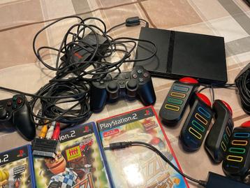 Te koop PlayStation 2 met 6 spellen  beschikbaar voor biedingen