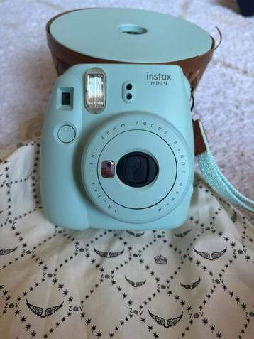 Nieuwe Instax Camera Pastel Blue met polsbandje beschikbaar voor biedingen