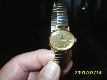 dames  horloge ( jaren eind.60....begin 70. ) opwinder beschikbaar voor biedingen