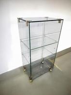 vintage glazen etagere / vitrine / rek op wieltjes, Boeken, Eén stripboek, Ophalen, Gelezen