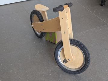 Stoere houten loopfiets naturel beschikbaar voor biedingen