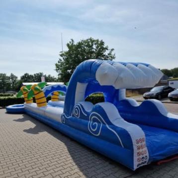 Springkussen bukkschuifbaan surf beschikbaar voor biedingen