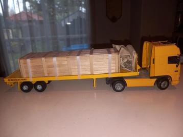 Nette daf 95XF met trailer en lading beschikbaar voor biedingen