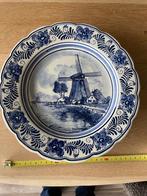 Delfts blauwe borden, Ophalen